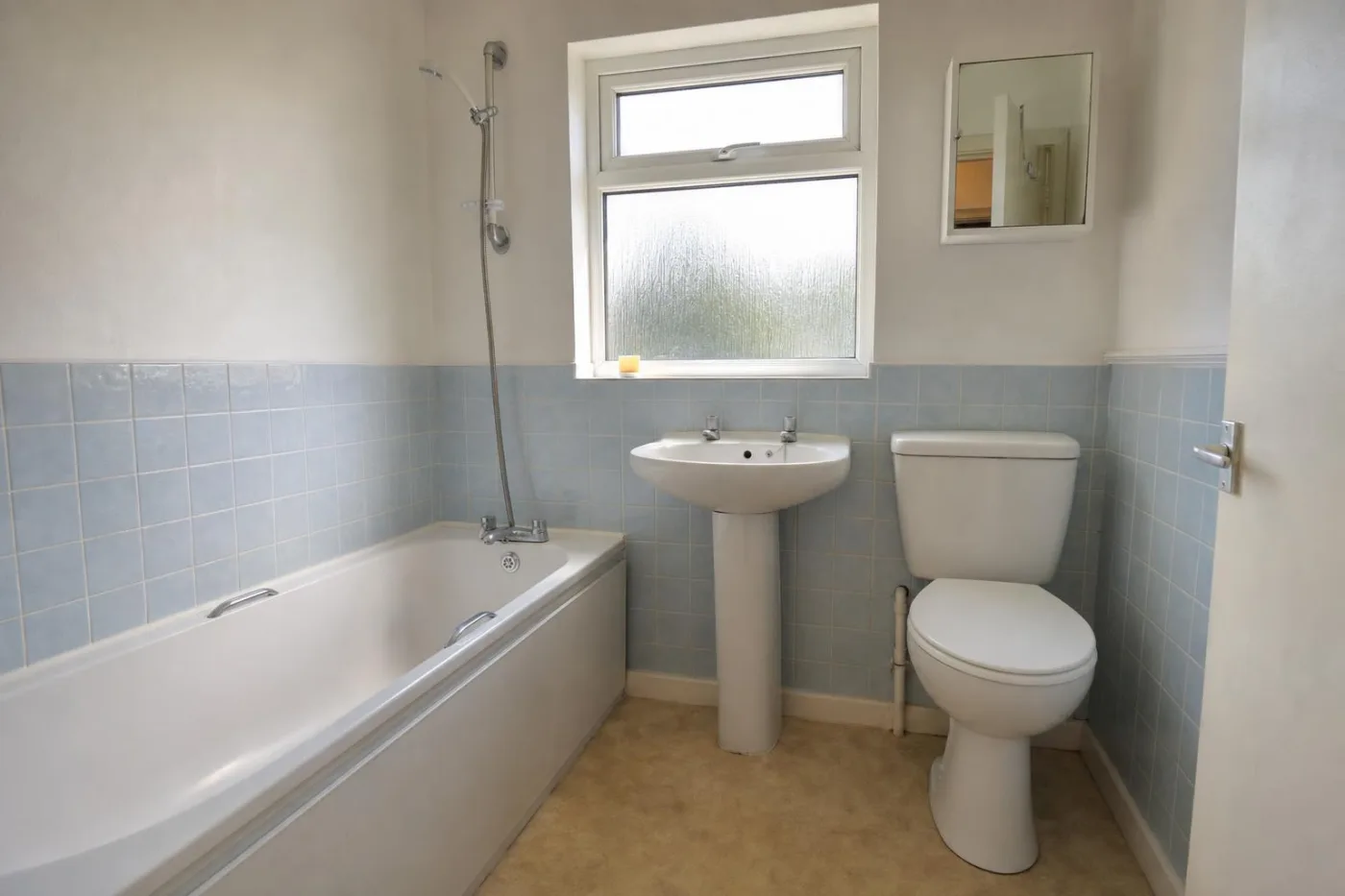 A small family bathroom photographed by the homeowner