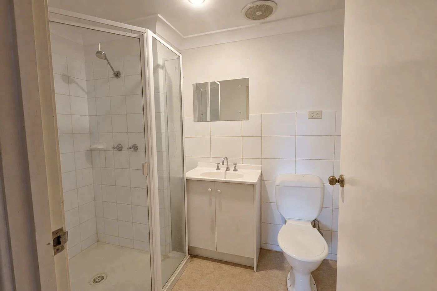 A small windowless ensuite photographed by the homeowner