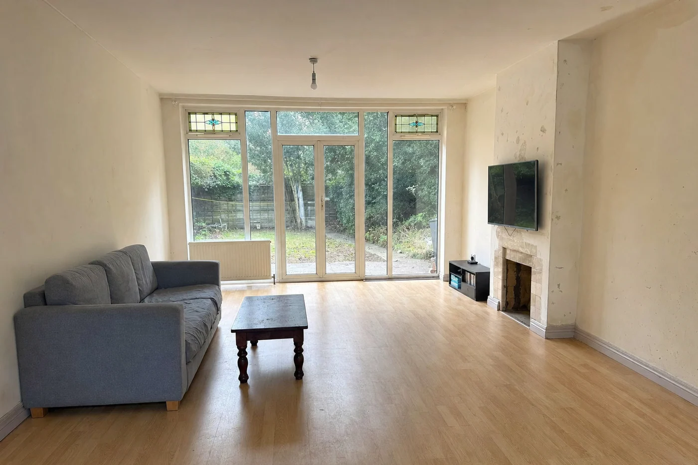 A large living room photographed by the homeowner